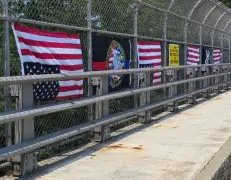 American flags destroyed on Cape Cod bridge honoring fallen Massachusetts marine